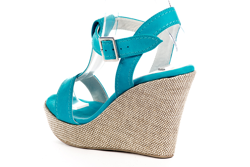 Turquoise blue women's fully open sandals, with an instep strap. Round toe. Very high wedge soles. Rear view - Florence KOOIJMAN
